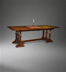 A fine Italian walnut trestle table. A fine Italian walnut trestle table.