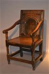 A Charles I oak wainscot chair.