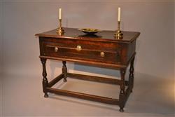 A large mid 17th century oak sidetable. A large mid 17th century oak sidetable.