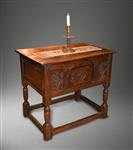 A mid 17th century oak table cupboard.