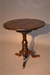 An early 18th century oak pedestal table. An early 18th century oak pedestal table.
