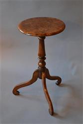 A Regency burr elm candle stand. A Regency burr elm candle stand.