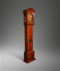 An early 18th century marquetry longcase clock. An early 18th century marquetry longcase clock.