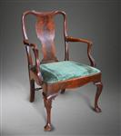 An early George II walnut armchair.