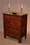 An early 18th century burr walnut and oak chest.