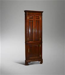 A Georgian oak standing corner cupboard. A Georgian oak standing corner cupboard.
