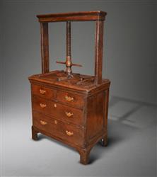A small mid 18th century oak press chest. A small mid 18th century oak press chest.