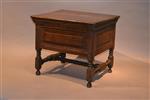 A Charles II oak box stool. 