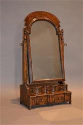 An elegant  Queen Anne walnut toilet mirror. An elegant  Queen Anne walnut toilet mirror.