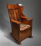 A George III oak lambing chair.