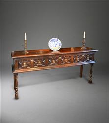 A late 17th century low dresser in patinated pine. A late 17th century low dresser in patinated pine.