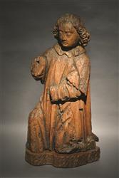 A late Gothic kneeling angel. A late Gothic kneeling angel.