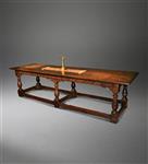 A Charles II oak six leg refectory table.