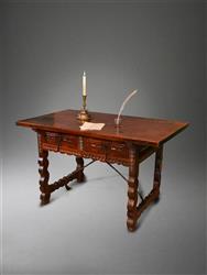 An 18th century spanish walnut writing table. An 18th century spanish walnut writing table.