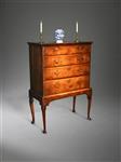 A George I walnut chest on stand.