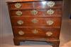 An elegant George II elm chest of drawers.