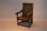 A  17th century child's wainscot chair. 