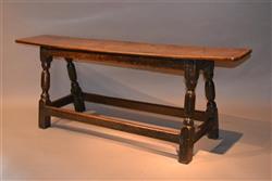 A Charles II oak bench or form.
