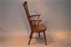A Thames Valley tall comb back Windsor armchair.