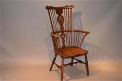 A Thames Valley tall comb back Windsor armchair.