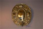A late 18th century brass wall sconce.