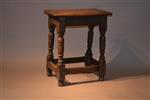 A Charles I oak joint stool.
