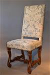 A set of six Louis XV walnut dining chairs.
