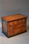 A Regency burr oak and inlaid miniature chest.