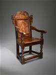 A magnificent early 17th century oak armchair.